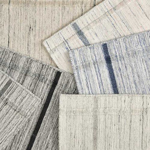 interplay: the intersection of plush ridges & stripes make gold coast a memorable, modern plaid rug