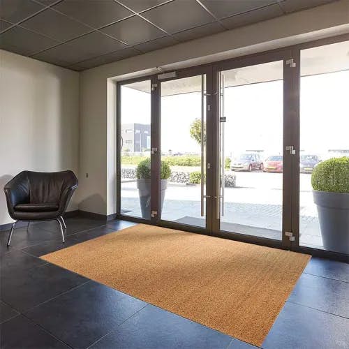 Poona Natural coir walk-off mat in corporate lobby