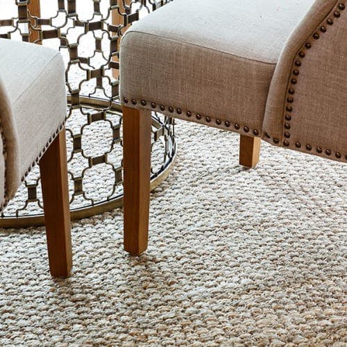 Bahama Birch jute rug underneath table and chairs.