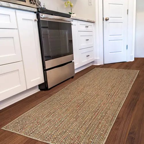 balance: warm colors complement a kitchen's hard-working surfaces (cozumel custom rug in color sunset)