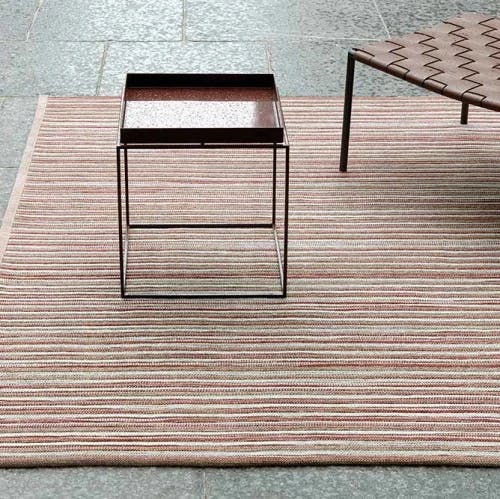 strike a balance: a levante area rug adds warmth to sleek tiled floors (color indian summer)