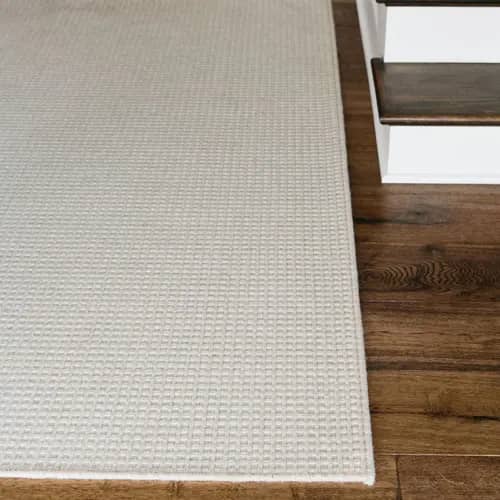 New England Harvest wool rug with serged edge in entry way