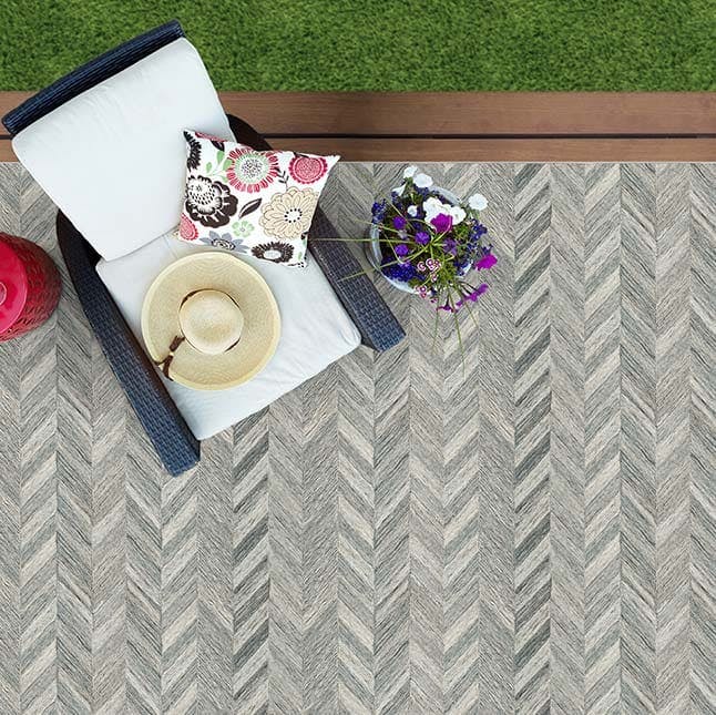 outdoor oasis: create an ideal lounging space on decks or patios with an indio synthetic rug (color fossil)