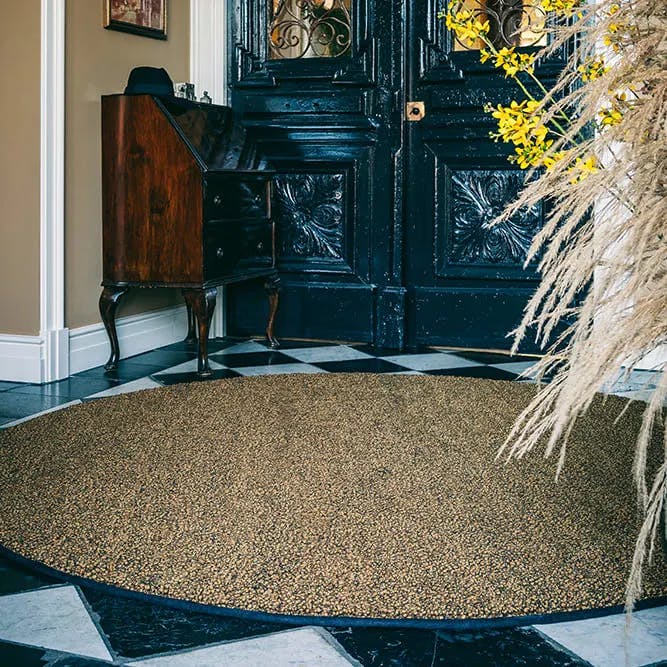Fingers Crossed Flavoured Ginger round entry way rug in elegant foyer