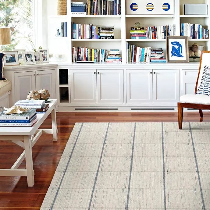 pattern play: gold coast's large scale plaid plays well with graphic design details (synthetic area rug in color admiral)