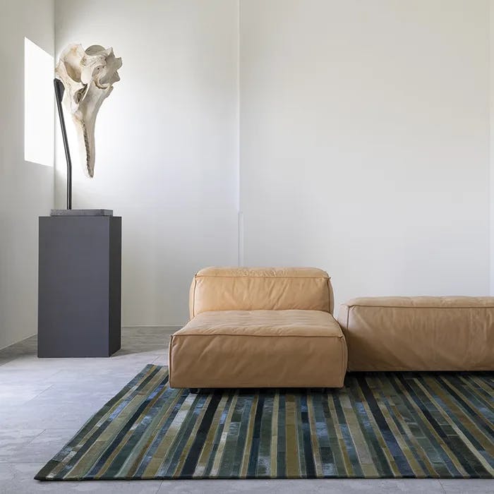 add a jewel tone spark: flash leather area rug in evergreen