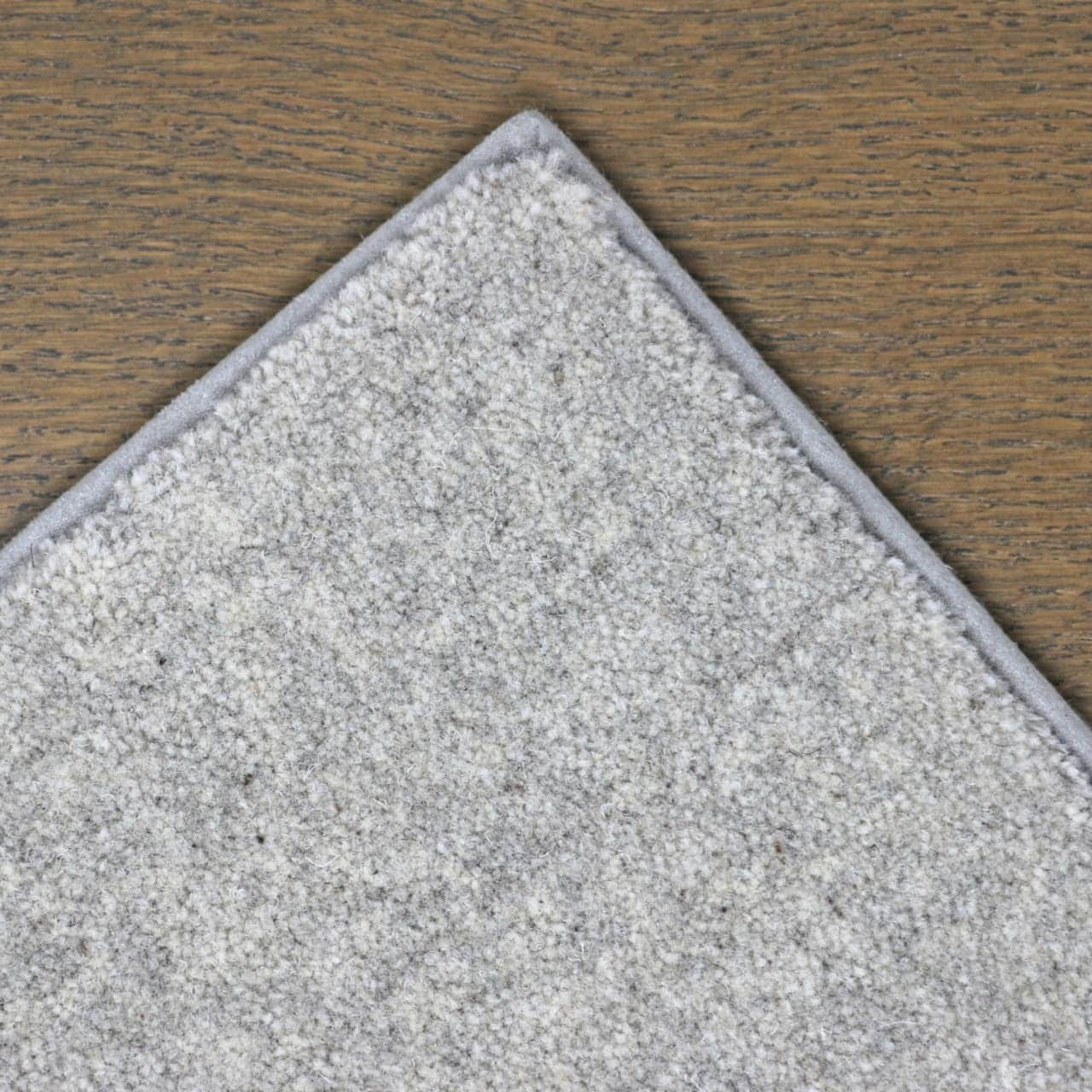 Fat Cat silver wool rug with blind soft border in material to match