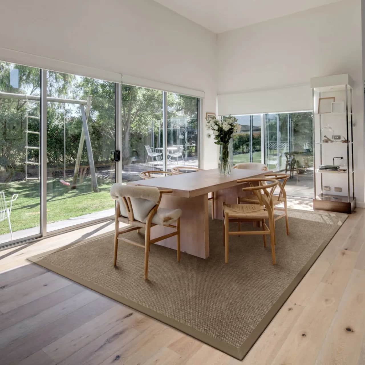 Cottage Bark area rug with cloth border in Scandinavian style dining room