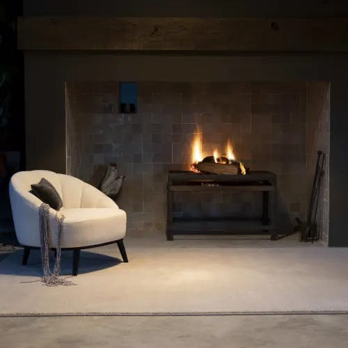 Fat Cat Silver wool rug by fireplace in sitting room