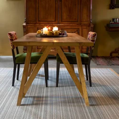 Masai Giraffe cloth bound wool rug in dining room